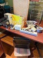 Overview of assorted office supplies on table
