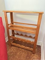 Front angled view of oak wine rack showing overall construction