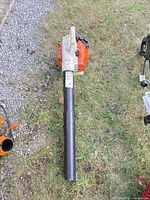 Top view of complete Stihl BG 55 blower with tube attached on grass