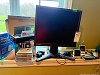 Overall lot: monitor, keyboard box, speakers, mice, software CDs, cables