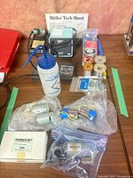 Overall lot showing soldering station, consumables, motors and accessories
