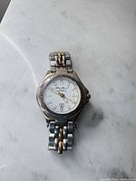 Front view of Eddie Bauer wristwatch showing dial, bezel and bracelet