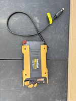 Top view of EverStart 1000W inverter with cigarette lighter cable attached