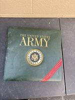 Front cover of dark green United States Army scrapbook album