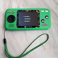 Front view showing screen, controls and game menu