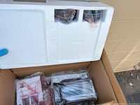 Styrofoam top showing packaged components in box