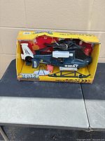 Front view of helicopter in open box