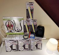 Group shot of all packaged lights, remote outlet kits, heater and small adapters