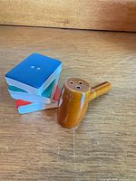 Gavel and book stack shakers standing upright