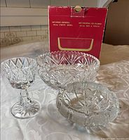 Group shot of all three crystal pieces with original box