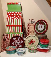 Group shot showing gift boxes stack, tins, trays and bags
