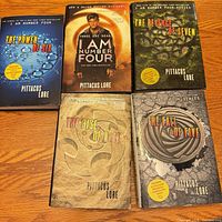 Front covers of all five books laid out