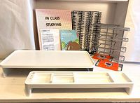 Group shot of all items including letter board, monitor riser, tray, cork magnet, file organizers