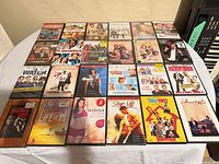 Tabletop image showing all 20 DVD cases in four rows of five