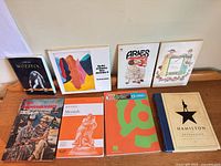 All seven books and sheet music volumes front covers visible