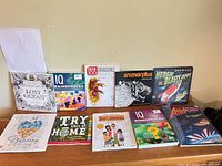 All ten books lined up showing covers and titles