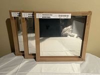 Three sealed square wooden IKEA SKOGSVÅG frames