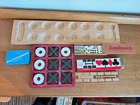 Top-down view showing all five game sets laid out together