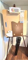Full view of easel with accessories displayed