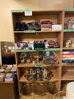 Front view of oak-veneered bookcase showing shelves and finish