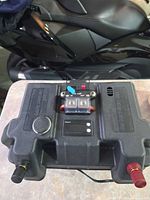 Top view showing breaker, USB port, voltmeter, terminals