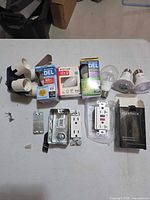 Overview of all bulbs, outlets, metal box, lamp sockets and hardware