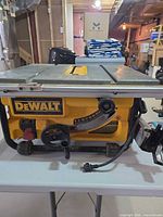 Front view of DeWalt DW745 table saw on stand