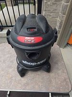 Front view of Shop-Vac showing size, colour, branding