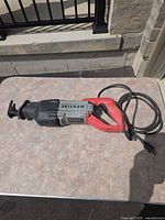 Full view of Skilsaw SPT44A reciprocating saw with cord