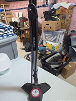 Full view of Zefal floor pump showing hose, handle, base and gauge