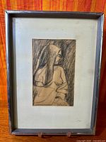 Framed drawing showing full artwork, mat, and frame