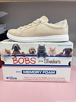Shoe box showing BOBS from Skechers branding and animals