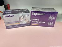 Front view of both sealed TopSum pheromone refill boxes