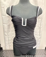 front view of tankini top and bottom on mannequin