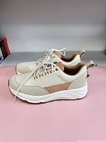 side view of both shoes showing color, sole and overall condition