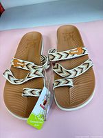 Top view of both sandals showing straps and footbeds