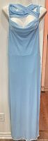 Front view of light blue sleeveless maxi dress with criss-cross bodice