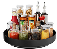 Web stock image showing the black metal lazy Susan in use with spice jars