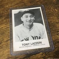 Front view of Tony Lazzeri card in plastic holder