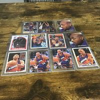 Grid of nine Charles Barkley cards in sleeves