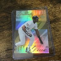 Front view of Frank Thomas holographic Season Five baseball card in plastic case