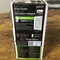 Front of sealed box showing Jasco In-Wall Smart Switch, QuickFit SimpleWire, Z-Wave Plus details, model 46562