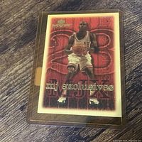 Front of Michael Jordan Upper Deck MJ Exclusives card in sleeve