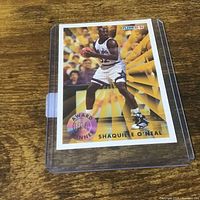 Front view of Fleer Shaquille O’Neal card in case