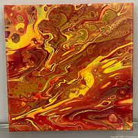 Front view of acrylic pour painting showing full abstract design