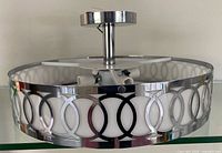 Overview of chrome ring-band ceiling fixture