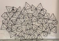 front view of entire geometric wall sculpture