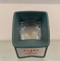 Front view showing Argus color viewer lens and logo