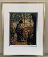 Framed Monet print with gold frame and mat