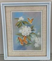 Front view of framed Tim Conners floral butterfly print